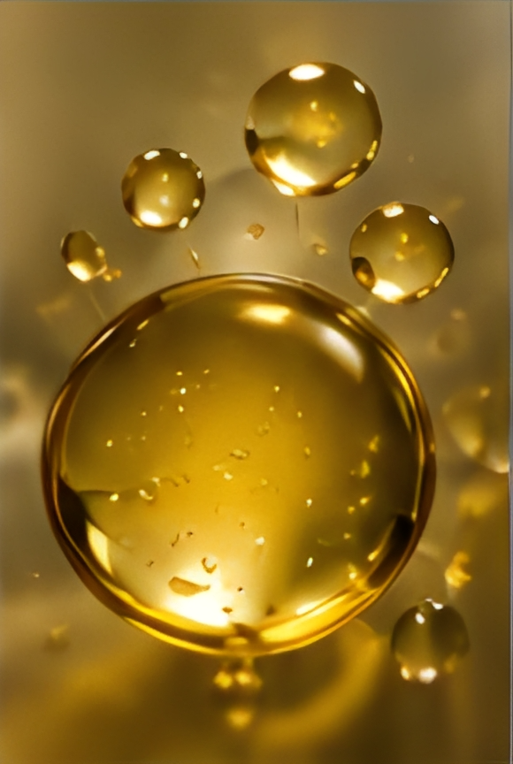 Golden oil droplets on smooth surface