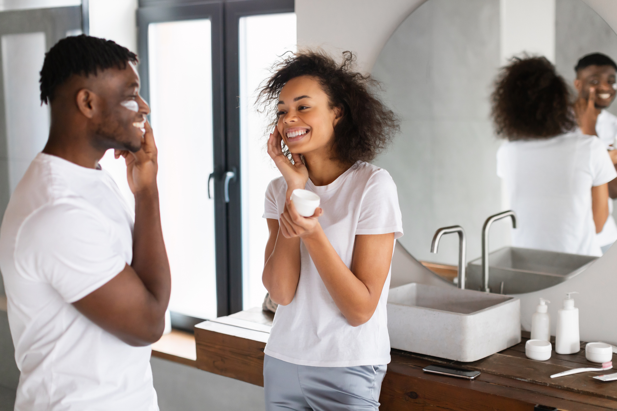 Morning skincare routine in modern bathroom